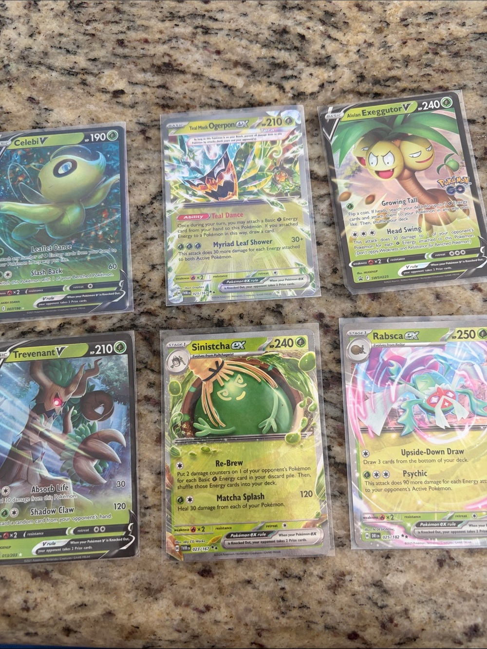 Assortment of 6 holo leaf type Pokemon cards